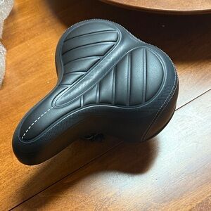 Unused Black Bicycle Seat with Stitching